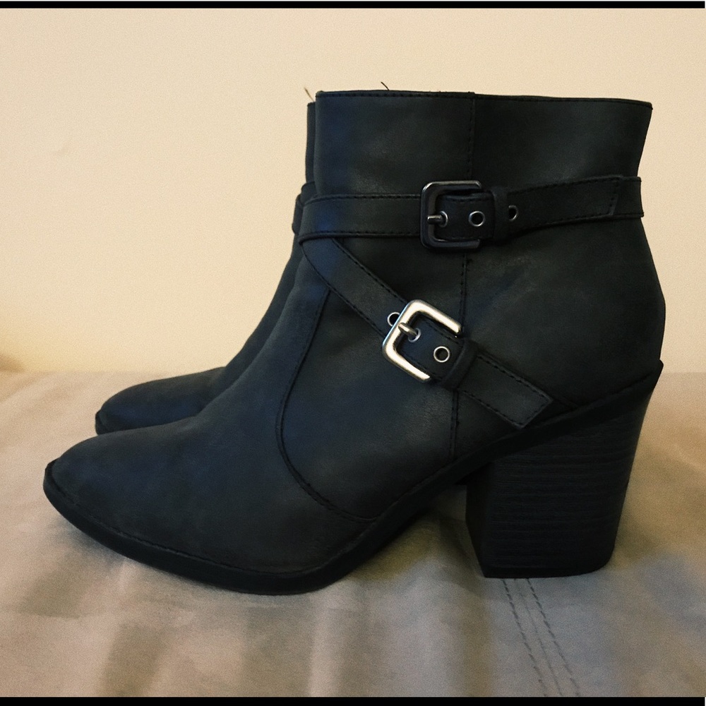 Gray heeled ankle boots.